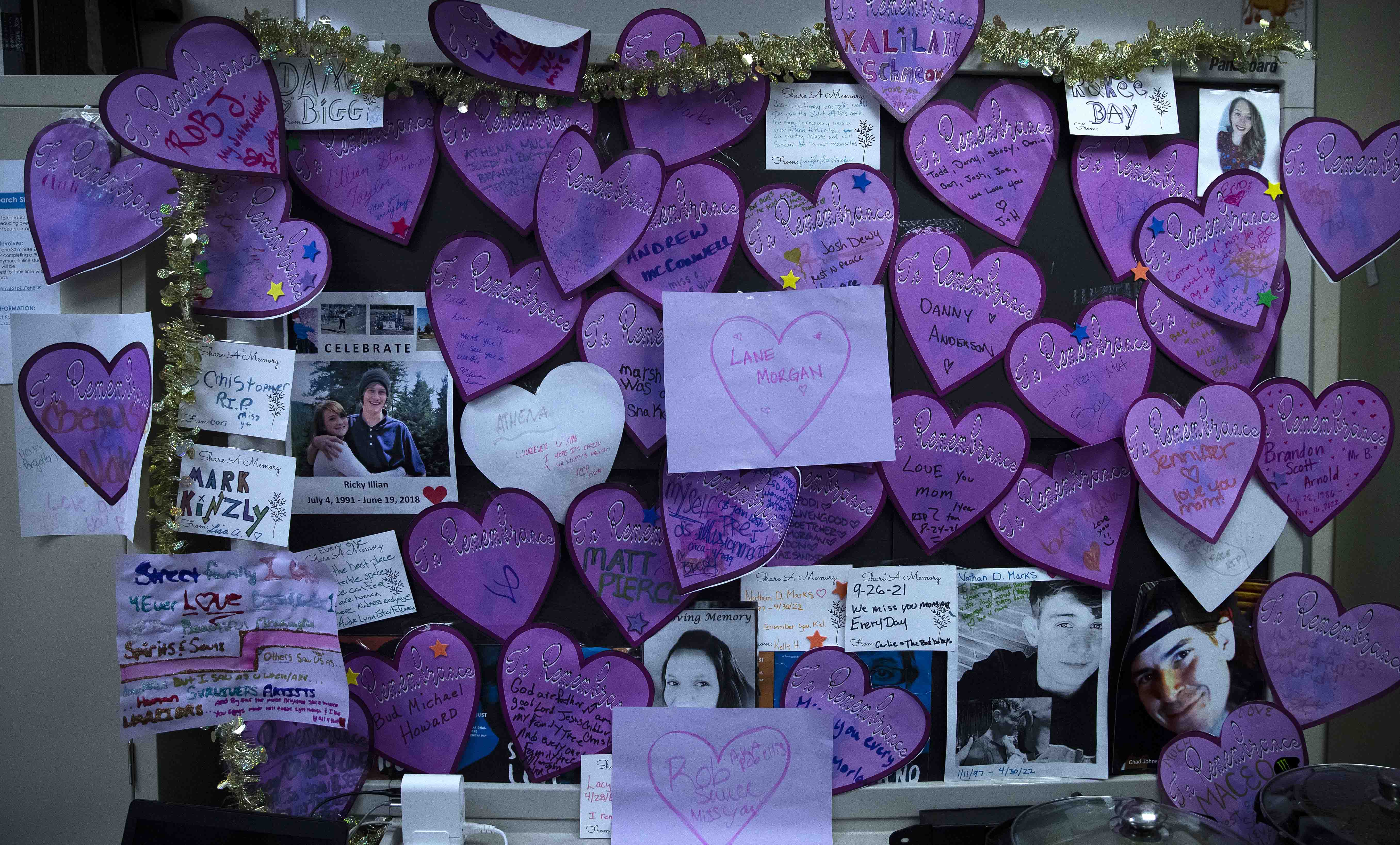 Photographs and letters to loved ones who have overdosed and died are displayed inside the harm reduction health center, a program at Clallam County Health and Human Services, on Tuesday, April 25, 2023, in Port Angeles. KUOW Photo/Megan Farmer.